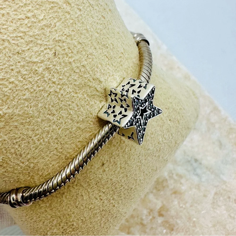 EUC Pandora 790016C01 Sterling Silver Asymmetric Star Charm w/ Clear CZ’s